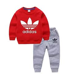 Trendy kids' Adidas printed sweatshirt-style tracksuit, comfortable and stylish.